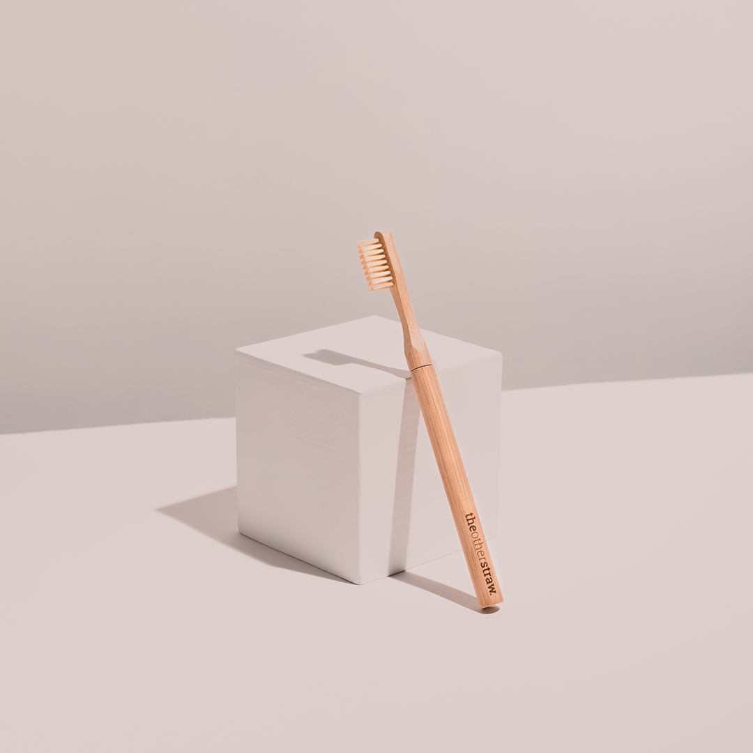 Bamboo toothbrush by Onestraw.