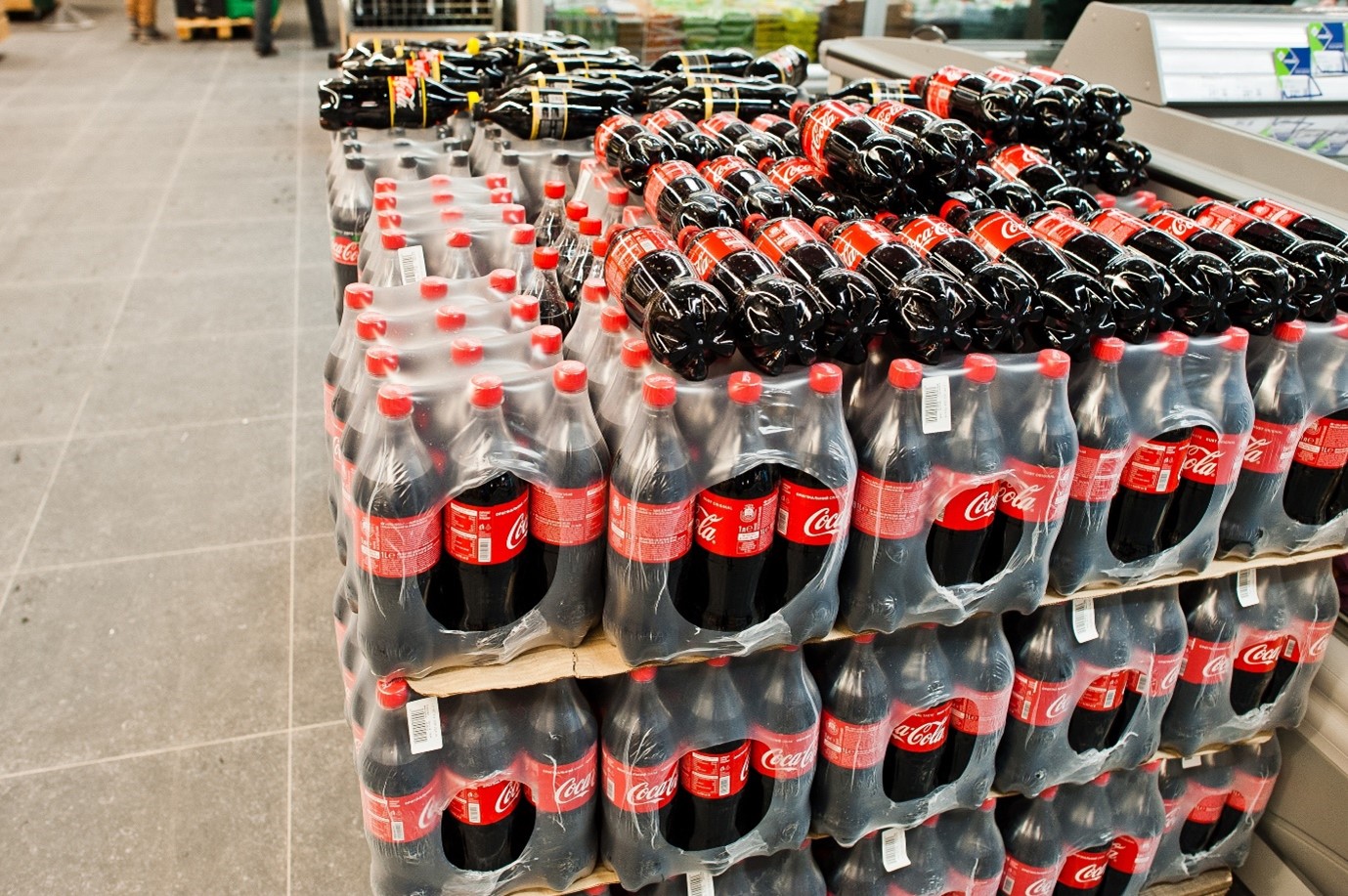 Coca-Cola bottles in a shop.