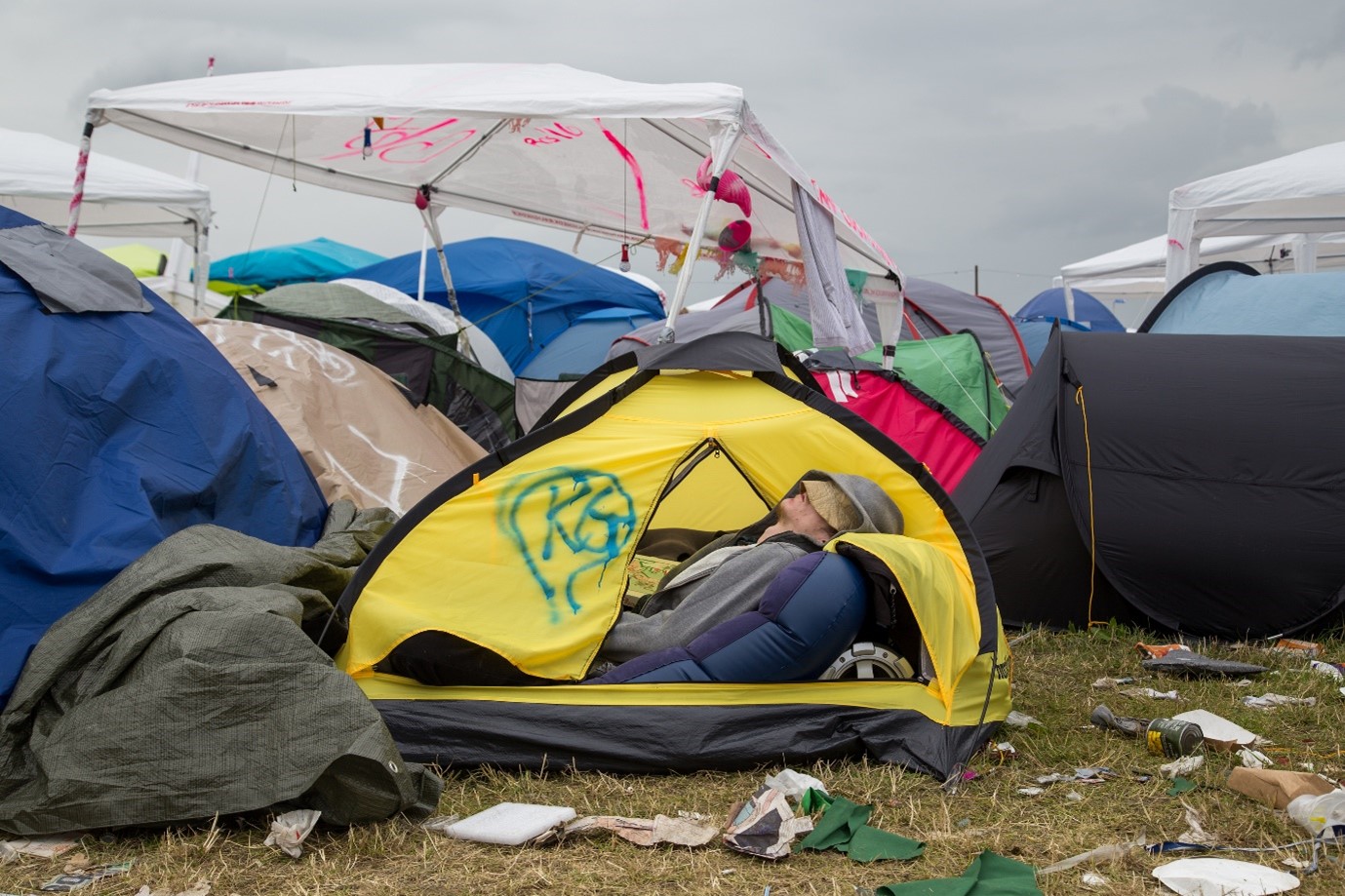 festival tents leftover with leftover rubbish