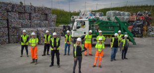Staff at Coastal Recycling celebrate.