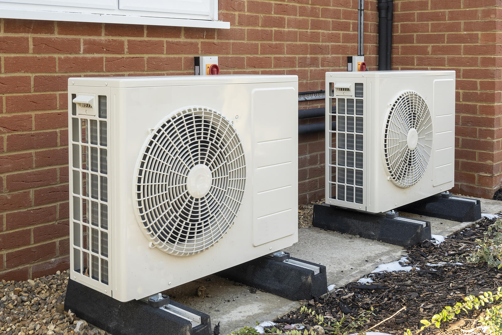 Heat Pump Units Installed On A House.