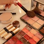 Makeup palette during makeup session in makeup studio
