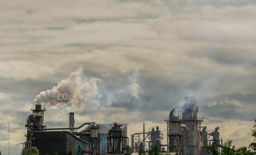 CO2 greenhouse gas emissions from factory chimneys.