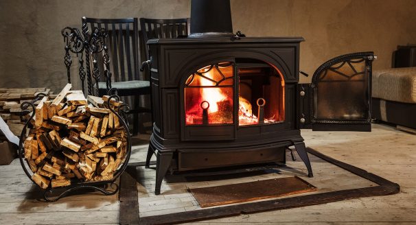 A wood burner firing brightly in a country house