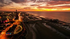 View of Blackpool's North Pier and beach at sundown